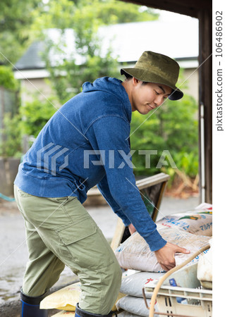 young male farmer 106486902