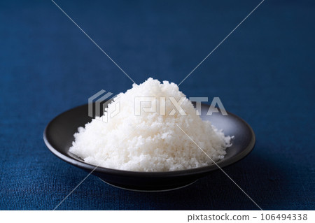 Natural salt served in a small plate 106494338