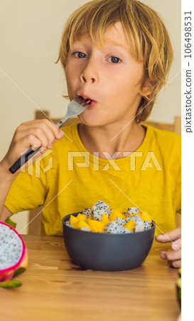 Boy eats fruit. Healthy food for children. Child eating healthy snack. Vegetarian nutrition for kids. Vitamins for children VERTICAL FORMAT for Instagram mobile story or stories size. Mobile wallpaper Boy eats fruit. Healthy food for children. Child eating healthy snack. Vegetarian nutrition for kids. Vitamins for children VERTICAL FORMAT for Instagram mobile story or stories size. Mobile wallpaper 106498531