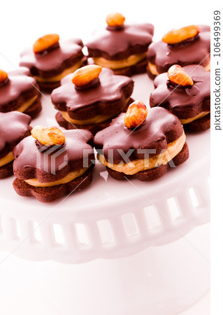 Mini peanut butter cookie tartes at dessert bar. Mini peanut butter cookie tartes at dessert bar. 106499369