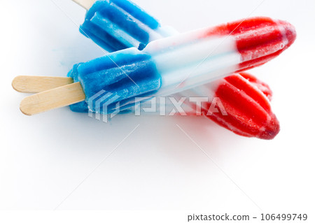 Popsicles with red, white, and blue colors. 106499749