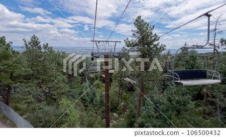 Ski lift ride at the Cheyenne Mountain Zoo during the summer. 106500432
