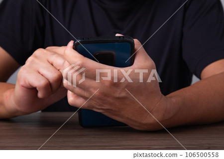Focus on hand Using Smartphone. 106500558
