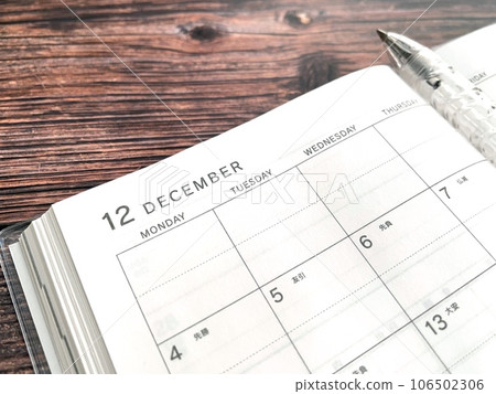 schedule book on the desk 106502306