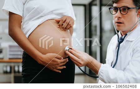 Pregnant african woman has appointment with - Stock Photo