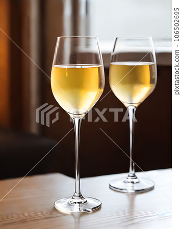 Realistic white wine cozy atmosphere warm lighting 106502695