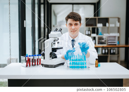 Modern medical research laboratory. female scientist working with micro pipettes analyzing biochemical samples, advanced science chemical laboratory . 106502805