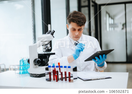 Modern medical research laboratory. female scientist working with micro pipettes analyzing biochemical samples, advanced science chemical laboratory . 106502871