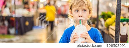 Young boy tourist on Walking street Asian food market BANNER, LONG FORMAT 106502991