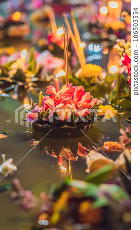 Loy Krathong festival, People buy flowers and candle to light and float on water to celebrate the Loy Krathong festival in Thailand VERTICAL FORMAT for Instagram mobile story or stories size. Mobile Loy Krathong festival, People buy flowers and candle to light and float on water to celebrate the Loy Krathong festival in Thailand VERTICAL FORMAT for Instagram mobile story or stories size. Mobile 106503554