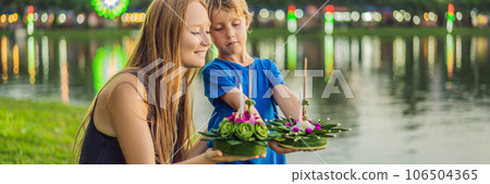 Mom and son tourists celebrates Loy Krathong, Runs on the water. Loy Krathong festival, People buy flowers and candle to light and float on water to celebrate the Loy Krathong festival in Thailand Mom and son tourists celebrates Loy Krathong, Runs on the water. Loy Krathong festival, People buy flowers and candle to light and float on water to celebrate the Loy Krathong festival in Thailand 106504365