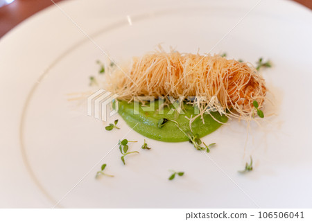 Grilled scampi kadaif wrap Grilled scampi kadaif wrap 106506041