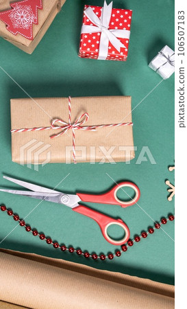 flat lay with christmas gifts and festive decoration flat lay with christmas gifts and festive decoration 106507183