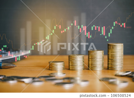 Stack of golden money coin with trading graph and chart. Financial investment concept use for background. 106508524