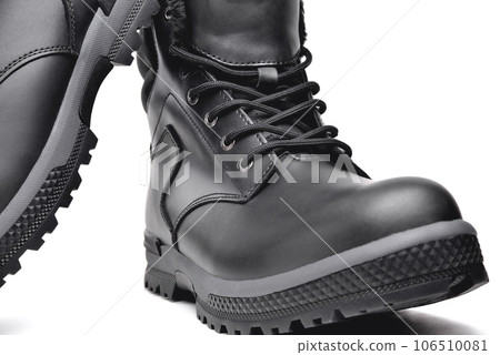 Winter men's black leather shoes on a white background, hiking shoes, practical off-road shoes, close-up details of the model, close-up i 106510081