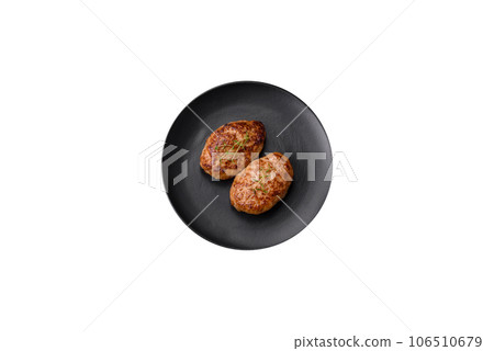 Delicious fresh fried minced fish cutlets with spices and herbs 106510679