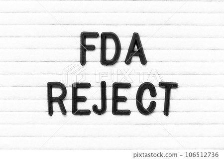 Black color letter in word FDA reject on white felt board background 106512736