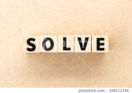 Alphabet letter block in word solve on wood background Alphabet letter block in word solve on wood background 106512746