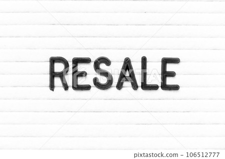 Black color letter in word resale on white felt board background Black color letter in word resale on white felt board background 106512777