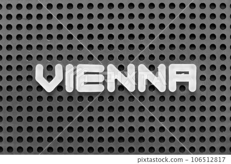 White alphabet letter in word vienna on black pegboard background 106512817