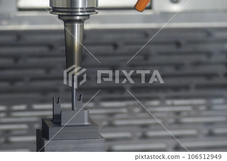 The CNC milling machine cutting the graphite electrode parts. The CNC milling machine cutting the graphite electrode parts. 106512949