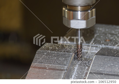 The CNC milling machine cutting press die part by solid bull end mill tool and G-code data background. 106512950