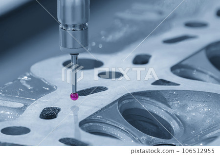 The multi axis CMM machine measuring the aluminum cylinder head parts . 106512955