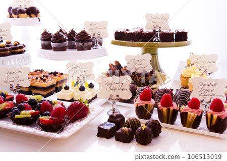 Dessert bar with assorted chocolate sweets. 106513019