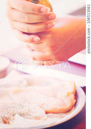 Kids learning how to make fresh fettucini with chicken, red peppers, and basil pesto. Kids learning how to make fresh fettucini with chicken, red peppers, and basil pesto. 106513061