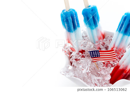 Popsicles with red, white, and blue colors. 106513062