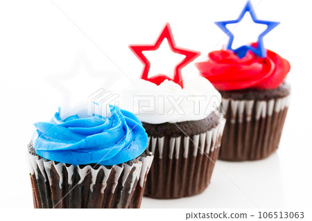 Patriotic holiday cupcakes decorated with stars. Patriotic holiday cupcakes decorated with stars. 106513063