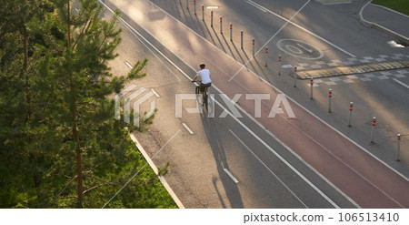 Man bicycling on cycling road. Top aerial view. 106513410