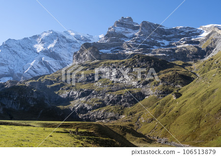 Switzerland Mountain valley Kiental, Berner Oberland Alps. Snow mountains, sunny weather, travel to Swiss. 106513879
