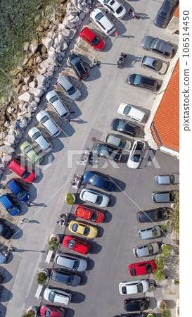 many cars parking in old resort red roofs town 106514450