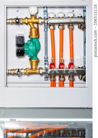 Heating system equipment, inlet manifold with micrometric shut-off valves and circulation pump. 106515118