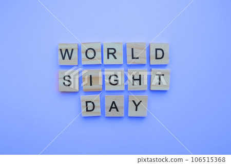 October 12, World Sight Day, minimalistic banner with the inscription in wooden letters 106515368