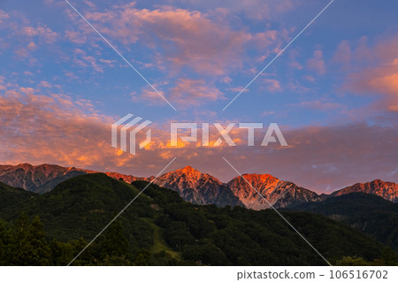 Hakuba Mountain range at sunrise Sunny scenery material 106516702