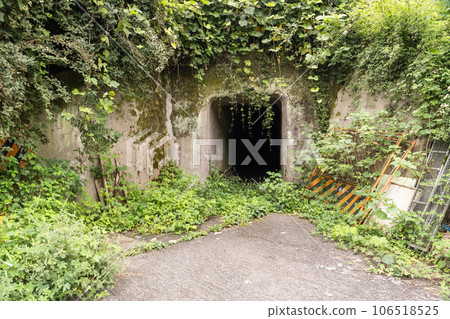 A closed and creepy tunnel deep in a deserted village A closed and creepy tunnel deep in a deserted village 106518525