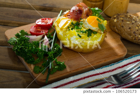 Appetizing baked potato filling with cheese 106520173