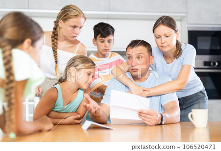 Big family reading upset letter Big family reading upset letter 106520471