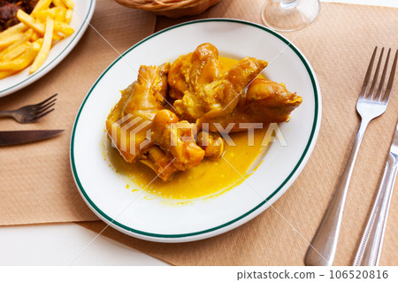 Meat dish with baked pork legs with spices Meat dish with baked pork legs with spices 106520816