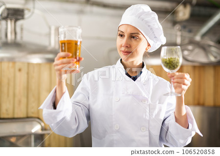 Portrait of woman brewer in beer factory Portrait of woman brewer in beer factory 106520858