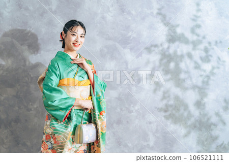 Portrait of a woman wearing furisode 106521111
