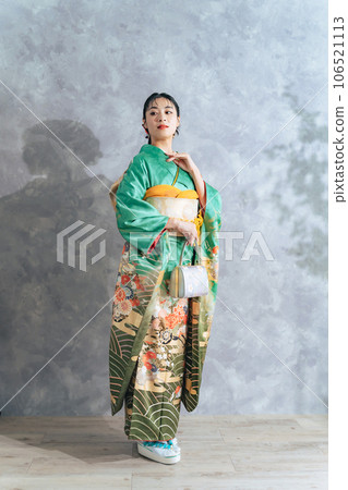 Portrait of a woman wearing furisode 106521113