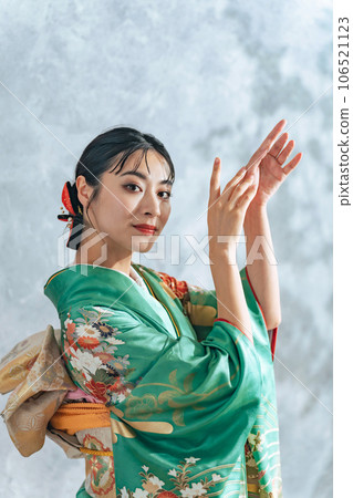 Portrait of a woman wearing furisode 106521123