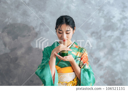 Kodo, a woman in a kimono holding an incense burner Kodo, a woman in a kimono holding an incense burner 106521131
