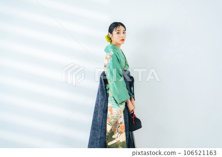 Portrait of a woman wearing furisode and hakama Portrait of a woman wearing furisode and hakama 106521163
