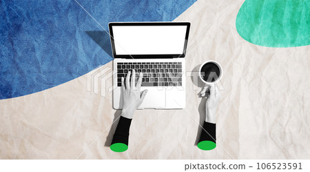 Person using a laptop computer Person using a laptop computer 106523591