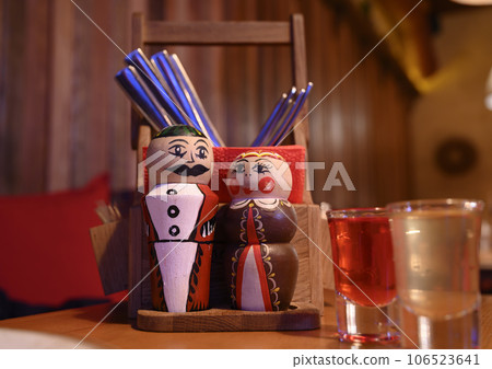 Salt and pepper shakers in the form of wooden figures in national Georgian outfits 106523641
