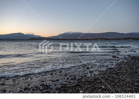 Sunset Autumn season in Abisko with Lake Tornetraesk in background, taken from Bjoerkliden, Swedish Lapland, Sweden Sunset Autumn season in Abisko with Lake Tornetraesk in background, taken from Bjoerkliden, Swedish Lapland, Sweden 106524401